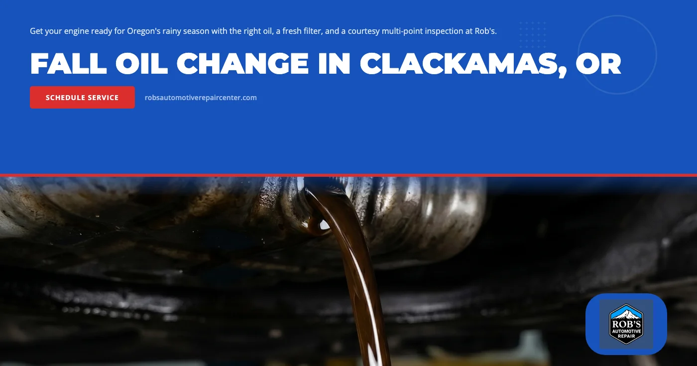 Fall oil change in Clackamas, OR β Rob's Automotive Repair technician draining old engine oil and replacing the filter on a lifted vehicle during a pre-rainy-season courtesy service