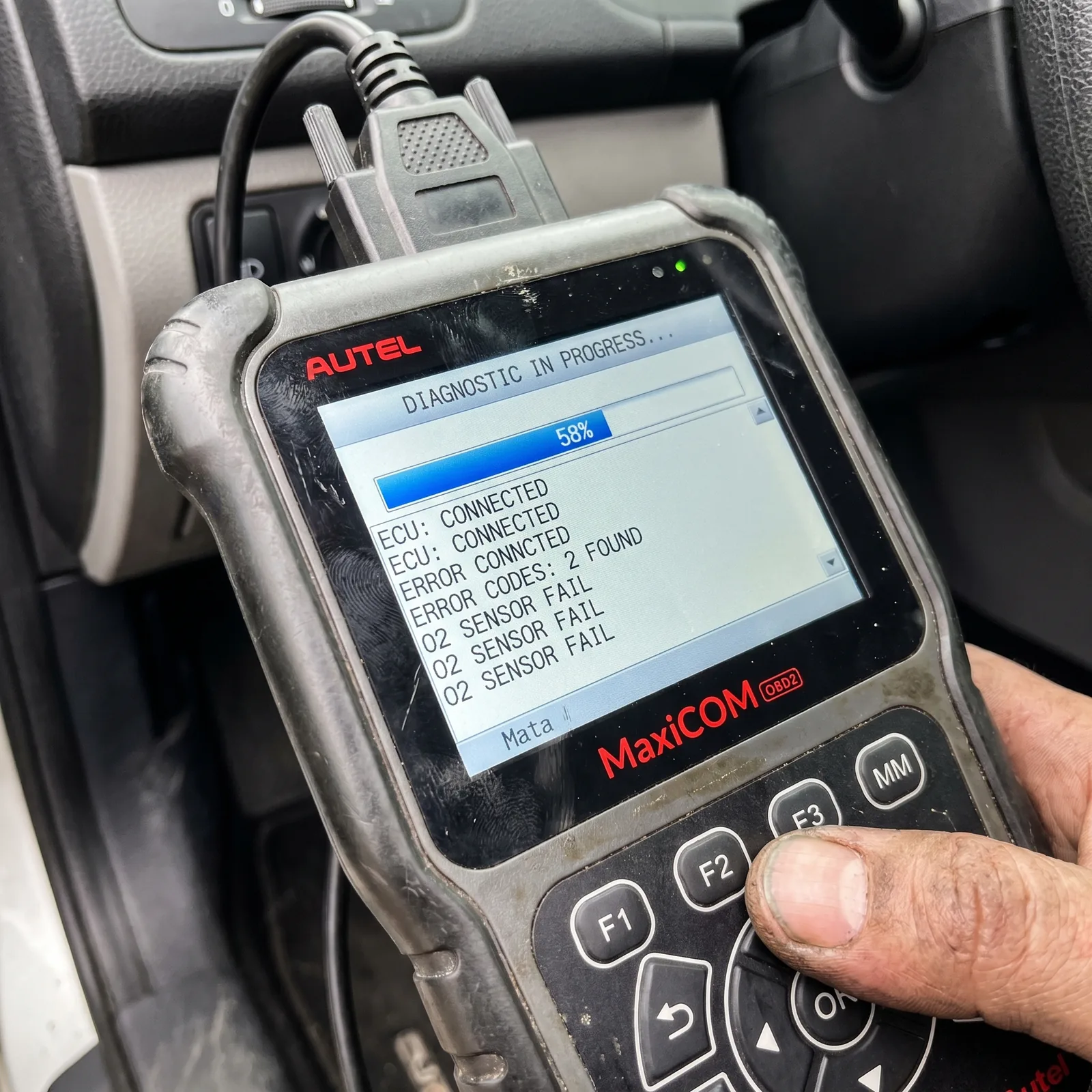 Computer diagnostics — Snap-on scanner reading vehicle codes